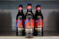 Woodbridge, Suffolk, UK November 01 2019; A trio of Adnams Broadside pale ale sitting on a shop shelf ready to be purchased Royalty Free Stock Photo