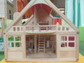 Woodcraft shaped home miniature in focus