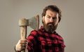 woodcutter use ax. selective focus. bearded man with axe. cut hair with ax. male hairdresser or barbershop. brutal