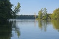 Wooded Island Reflected in Calm Lake