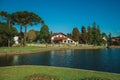 Wooded park with lake and rustic house in Gramado