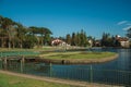 Wooded park with lake and rustic house in Gramado