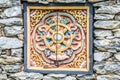 Wooded window and rock wall from bhutan Royalty Free Stock Photo