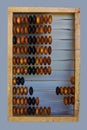 Wooden abacus on a light background