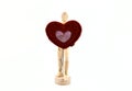 Wooden action figure with heart
