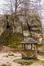 A wooden alcove in the rocks of Dovbush in Ukrainian Carpathian