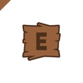 Wooden alphabet or font blocks with letter e in wood texture area with outline. Royalty Free Stock Photo