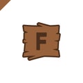 Wooden alphabet or font blocks with letter f in wood texture area with outline. Royalty Free Stock Photo