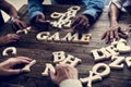 A wooden alphabet word game on wooden table Royalty Free Stock Photo