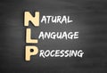 Wooden alphabets building the word NLP Royalty Free Stock Photo