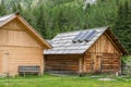 Wooden alpine cabin with solar panel, Austria