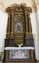 Wooden altar dedicated to the coronation of the Virgin, carved w