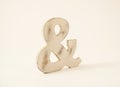 Wooden Ampersand sign on a white background