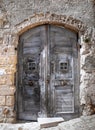 Wooden Ancient Frontdoor. Royalty Free Stock Photo
