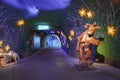 Wooden animal statue by decorations in illuminated alps tunnel