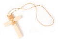 Wooden antique look crucifix necklace isolated
