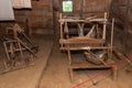 Wooden antique loom in a wooden house Royalty Free Stock Photo