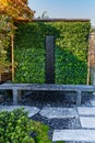 Wooden arbor. Modern wooden gazebo with vertical greening. Canopy in residential garden. Urban gazebo