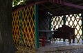 Wooden arbor in the yard with chairs and a table Royalty Free Stock Photo