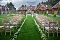 Wooden arch and chairs at wedding ceremony Royalty Free Stock Photo