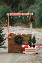 Wooden arch for photoshoot with pine.