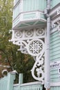 Balcony of an old wooden house. Beautiful carved elements of Russian architecture Royalty Free Stock Photo