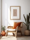 Wooden armchair near white stucco wall with three posters. Boho interior design with home decor