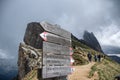 wooden arrow direction signs on the Seceda crest Royalty Free Stock Photo