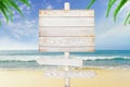 Wooden arrow signs on beach background Royalty Free Stock Photo