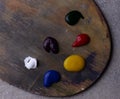 Wooden art palette with colors up close