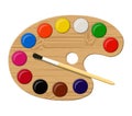Wooden art palette with paints and brush Royalty Free Stock Photo