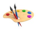 Wooden art palette with paints and brushes Royalty Free Stock Photo