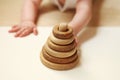 Wooden baby pyramid - representing pyramid of needs