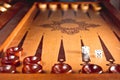 Wooden backgammon game. dice game on a wooden Board. Strategy and competition in the backgammon Board game. Dice and Royalty Free Stock Photo