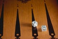 Wooden backgammon game. dice game on a wooden Board. Strategy and competition in the backgammon Board game. Dice and Royalty Free Stock Photo