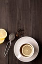 Wooden background with black tea, lemon and honey Royalty Free Stock Photo