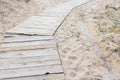 Wooden path among the sands Royalty Free Stock Photo