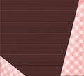 Wooden background with a checkered tablecloth