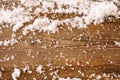 Wooden background covered with snow