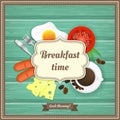 Wooden background with fried egg, sausage, coffee, tomato, cheese, fork and knife