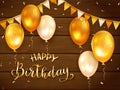 Wooden Background with Golden Birthday Balloons Royalty Free Stock Photo