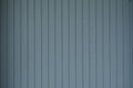 Wooden background from gray vertical narrow boards