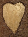 Wooden background with a heart