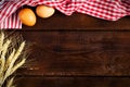 Wooden background, kitchen towel and cooking ingredients Royalty Free Stock Photo