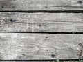 Wooden background made of old wood planks with natural patterns and rough texture to it, used for surface coverage Royalty Free Stock Photo