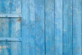 Wooden background. Old blue shabby wood planks. A tattered dilapidated door. Natural creative texture for editing and design Royalty Free Stock Photo
