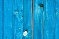 Wooden background, part of a wooden fence, old tree with holes