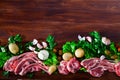 Wooden background with raw lamb, vegetables, greens Royalty Free Stock Photo