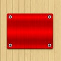 Wooden background with red metal plate Royalty Free Stock Photo