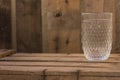 Rococo cristal glass on a wooden table Royalty Free Stock Photo